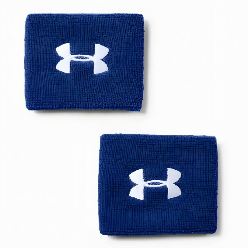 An Under Armour Men's Performance Wristbands (2 Pack), shown laid flat to display the pair of wristbands