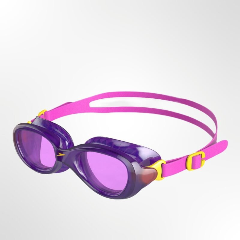 Experience a clear and comfortable swim with the Speedo Futura Classic Junior Goggles in a vibrant Purple/Pink design. As a classic staple in the Speedo lineup, these goggles are a reliable choice for young swimmers. The clear lenses are ideal for indoor pools or low-light conditions, providing excellent visibility to help them learn and feel confident in the water. The Futura Classic Junior goggles feature anti-fog coated lenses to ensure a consistently clear view of the water, while UV protection shields your child's eyes from the sun's harmful rays. The wide-vision lens offers enhanced peripheral vision, allowing them to see more of their surroundings. With a comfortable and adjustable head strap, you can easily find the perfect tension for a secure, leak-free fit. Key Features: Futura Classic Design: A timeless and reliable design trusted by swimmers. Clear Lenses: Ideal for indoor swimming or low-light conditions. Anti-Fog Lenses: Ensures a clear view throughout their entire swim. UV Protection: Guards your child's eyes against the sun's harmful UV rays. Wide-Vision: Offers enhanced peripheral vision for a broader view.