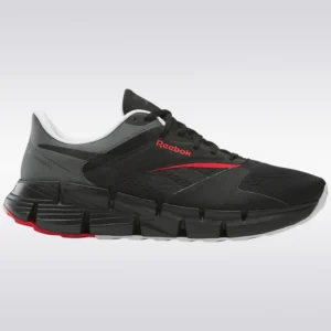 A side view of the Reebok Unisex Zig Dynamica 5 running shoes, highlighting the signature zigzag-shaped Zig Energy Shell midsole.